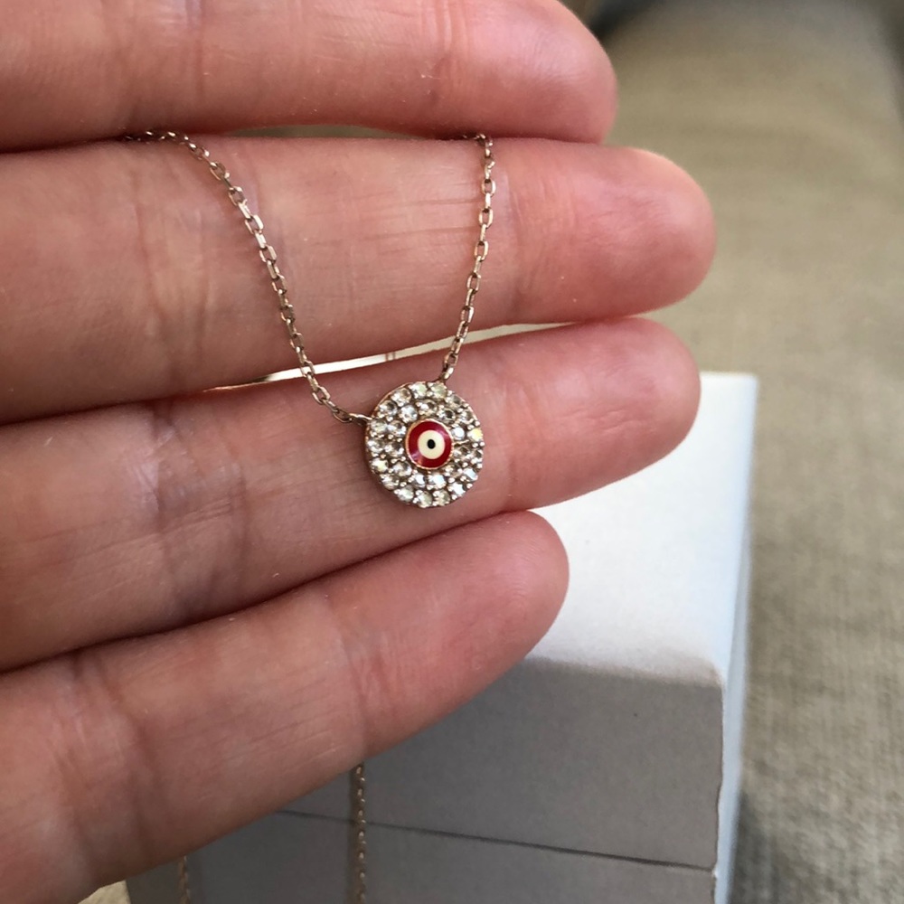 Sterling silver and enamel evil eye necklace.